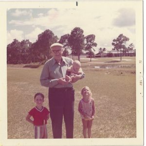 Patrick, my father, Danny in his arms and Ili